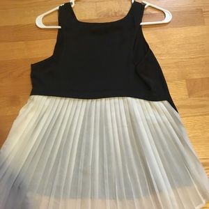 Black and white sleeveless blouse